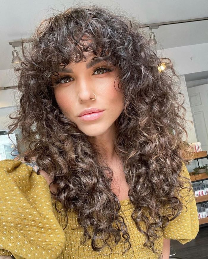 Curly Curtain Bangs with Defined Waves