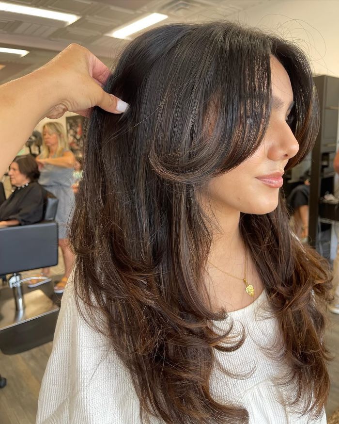 Curtain Bangs with Shoulder-Length Waves