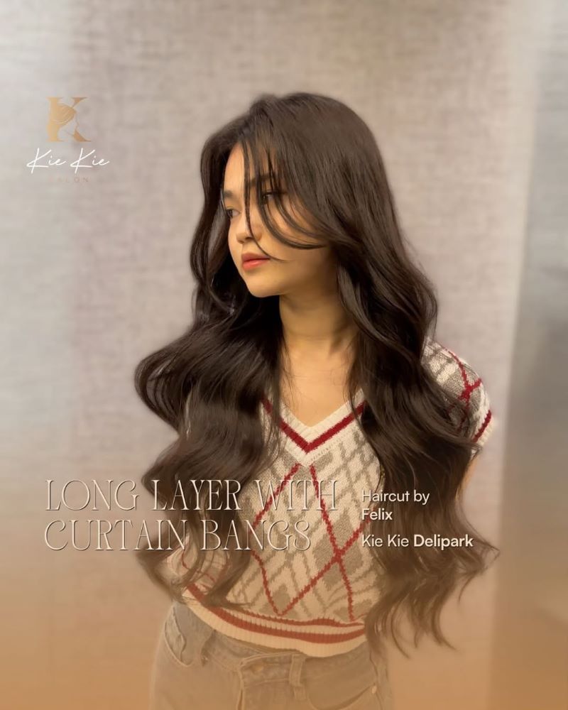 Long Curtain Bangs with Layered Waves